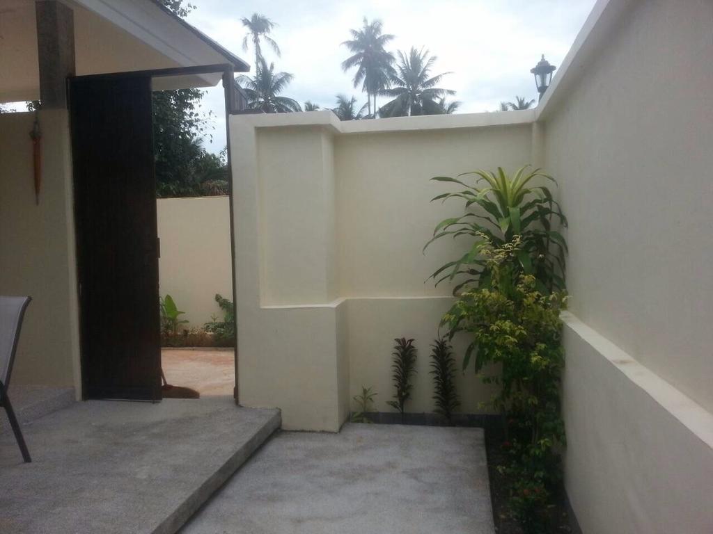 Khanom Garden Suite Pokoj fotografie